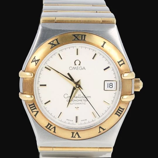 Omega Constellation - Automatic watch in yellow gold and steel