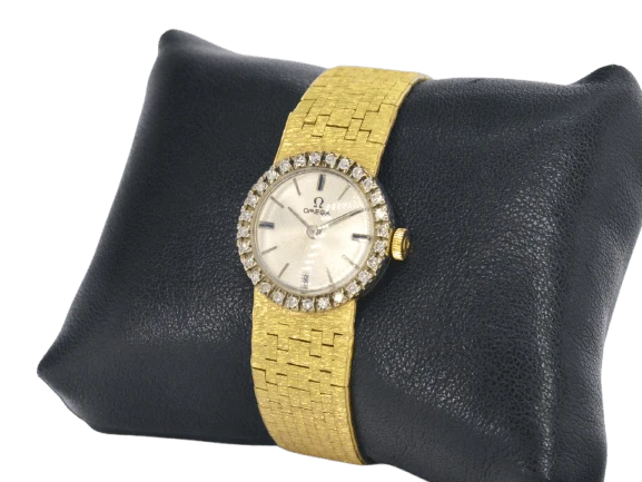 Omega - 18-carat gold mechanical watch and diamonds