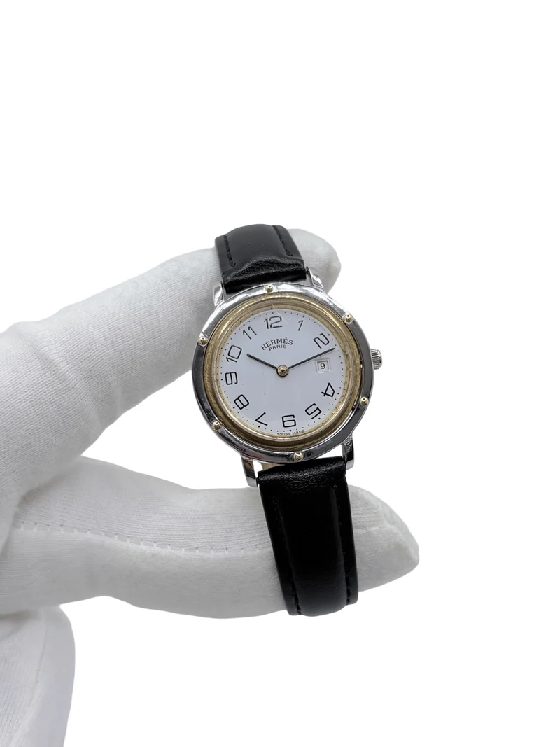 Hermès Clipper - 30 mm quartz watch in steel and yellow gold