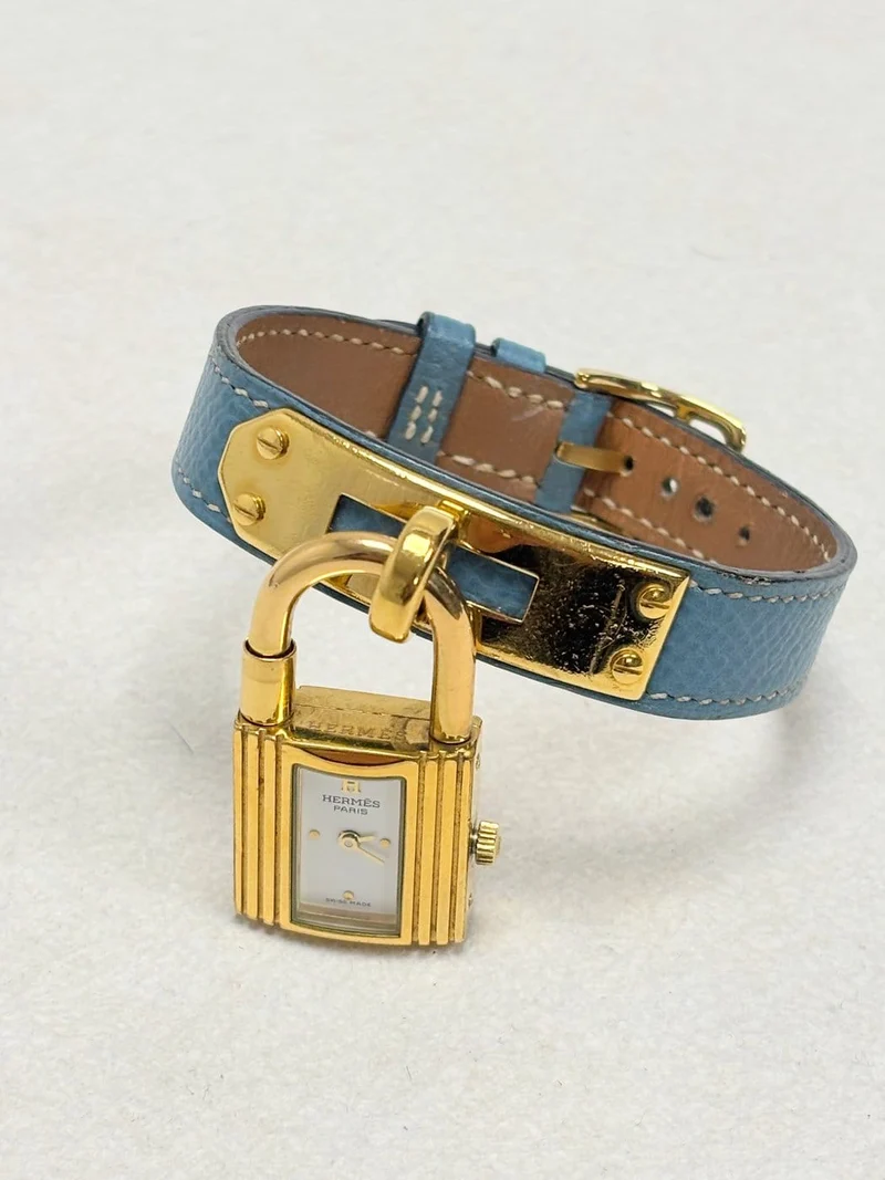 Hermès Kelly - Gold-plated watch and red leather