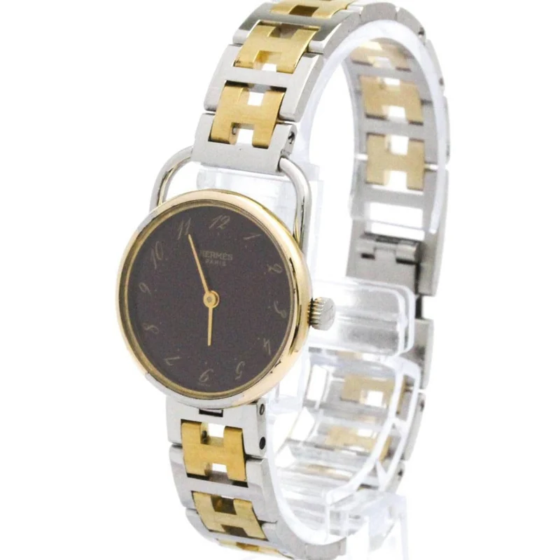 Hermès Arceau - Quartz watch in steel and gold-plated metal