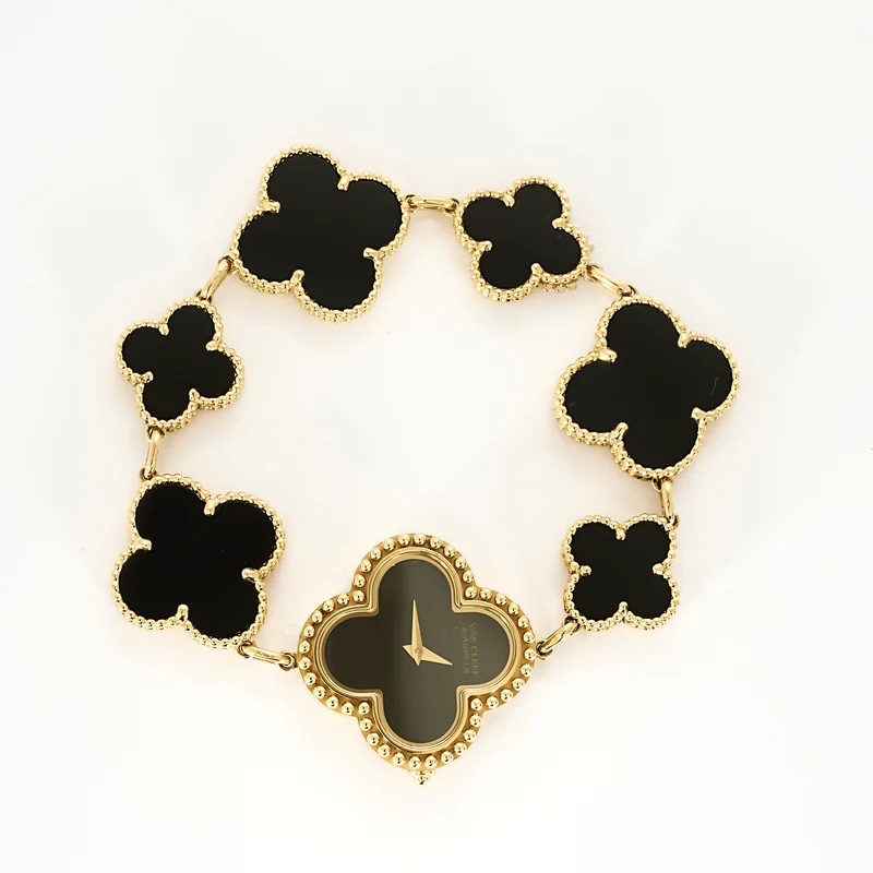VAN CLEEF & ARPELS - Alhambra - Ladies' wristwatch in yellow gold and onyx