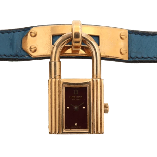 Hermès Kelly - Steel and yellow gold watch, burgundy dial