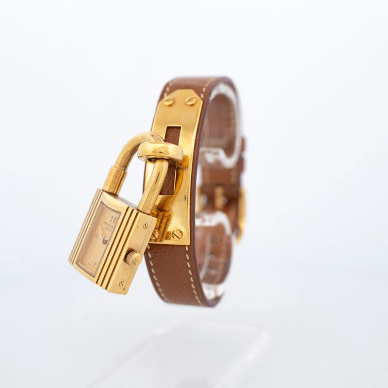 Hermès Kelly - Gold-plated steel watch with champagne dial
